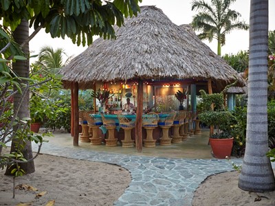bar-full-at-dusk-chabil-mar-resort-belize bar full at dusk chabil mar resort belize